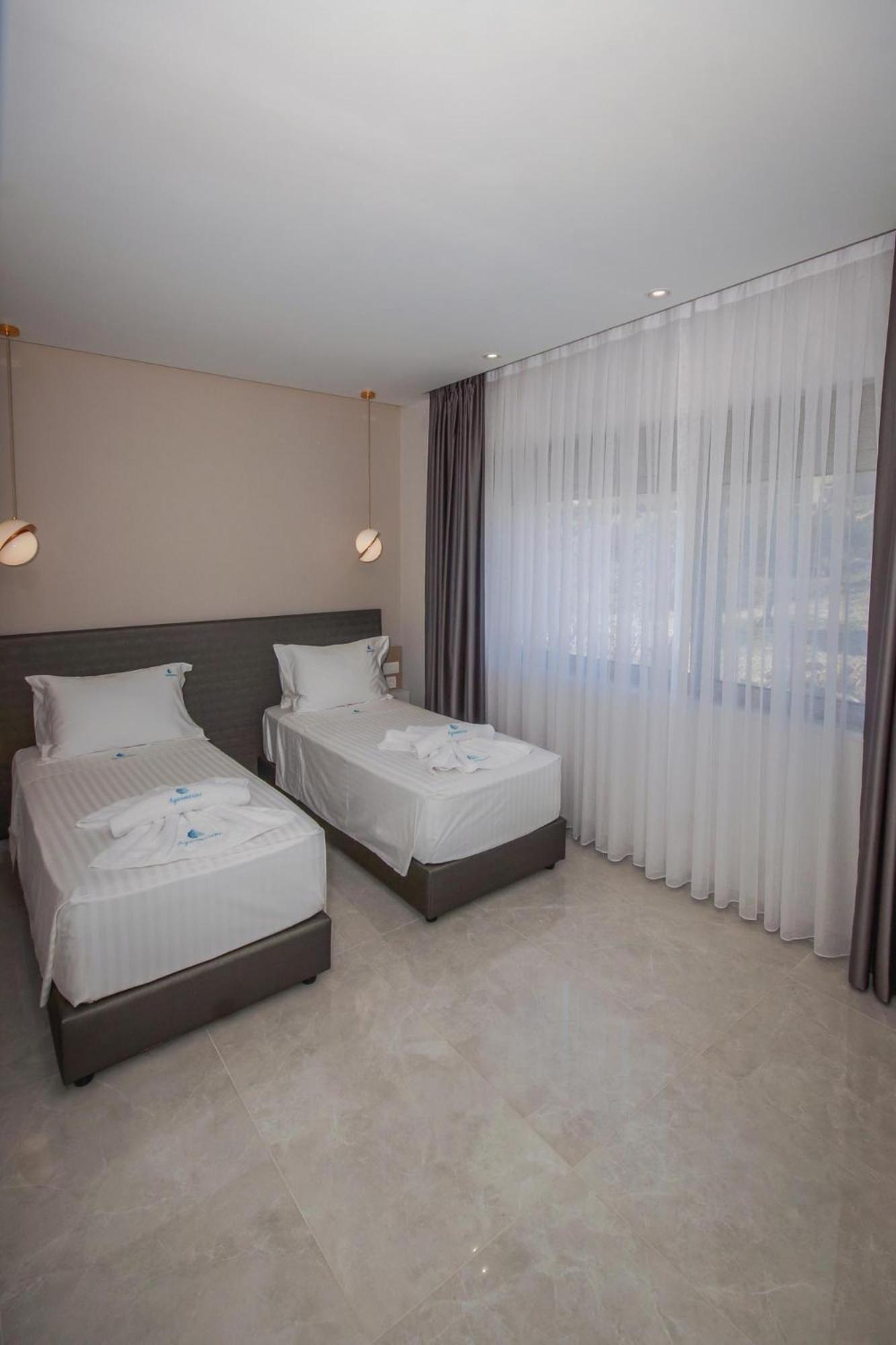 Aquamarine Luxury Suites Archangelos  Exterior photo